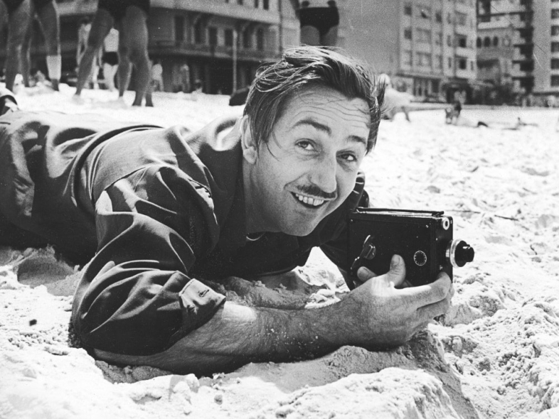 disney-walt-001-lying-on-beach-sand-with-camera-copyright-getty-images-licence-bfi-sight-sound-magazine